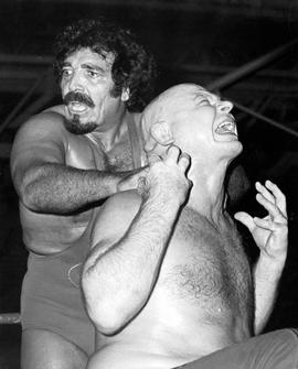 Sheik Adnan El Kaissey wrestles Baron Von Raschke at Halenbeck Hall (1965), St. Cloud State University