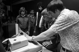 Math Contest participants look at a computer, St. Cloud State University