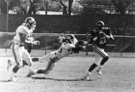 Stacy Jameson alludes a tackle during a football game, St. Cloud State University