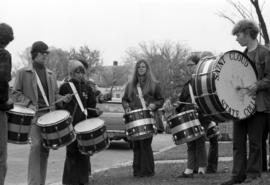 Students practice playing drums at band practice, St. Cloud State University