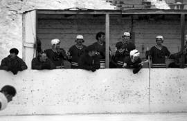 St. Cloud State University bench during a hockey game against St. Olaf