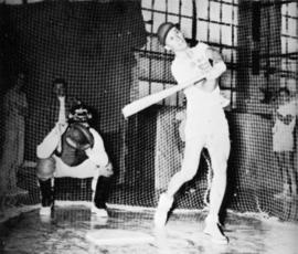 "Wayne Fleischer, Huskie shortstop, raps a few early in the spring with the help of a batting cage in Eastman Hall," St. Cloud State University