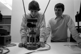 Ben Richason shows student Tim Brown how to use a Kelsch stereo plotter, St. Cloud State University