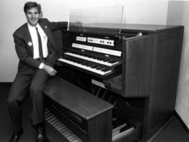 Joe Opatz displays the carillon keyboard in Atwood Memorial Center (1966), St. Cloud State University