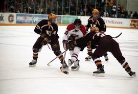 Action during a hockey game against the University of Minnesota, St. Cloud State University