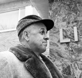 Luther Brown stands outside of Kiehle (1952), St. Cloud State University