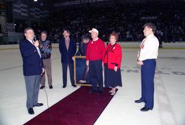 Robert Bess speaks during the National Hockey Center rink dedication