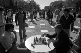 President Charles Graham plays human chess during homecoming, St. Cloud State University