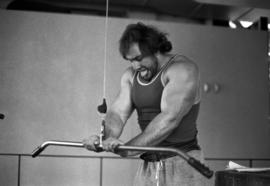 Paul Ellering lifts weights, St. Cloud State University