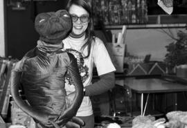 Kathy Gerdts holds an ET puppet at the Campus Laboratory School, St. Cloud State University