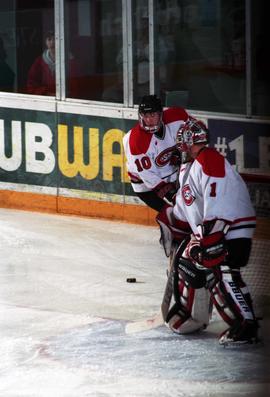 Action during a hockey game against the University of Wisconsin, St. Cloud State University