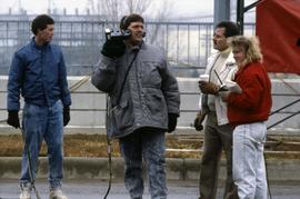 Paul Cahill and students use a video camera, St. Cloud State University