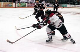 Action during a hockey game against the University of Minnesota, St. Cloud State University