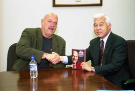 Jesse Ventura and St. Cloud State University president Roy Saigo