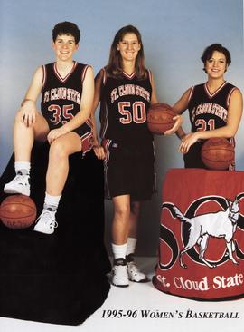 Brenda Meyer stands with other basketball players, St. Cloud State University