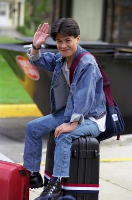 A student waves hello during move-in, St. Cloud State University