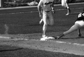 A player runs to first base during a St. Cloud State University baseball game against the University of Minnesota-Duluth