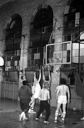 Students play basketball in Eastman Hall (1930), St. Cloud State University