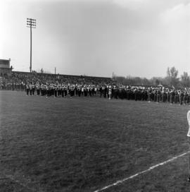 Marching band performing at halftime at the homecoming football game, St. Cloud State University