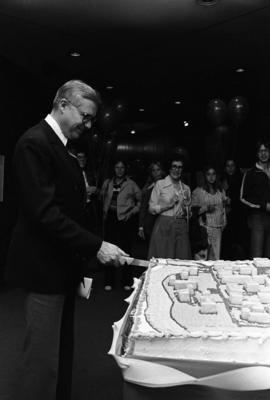 President Charles Graham cuts a cake during the 110th anniversary celebration of the establishment of St. Cloud State University