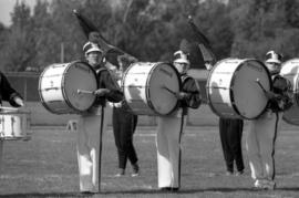 Marching band performs at a football game, St. Cloud State University