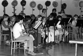 Children play musical instruments during a concert, St. Cloud State University