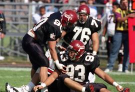 Matt Vardas and other St. Cloud State football players get up after a tackle against the University of Nebraska-Omaha, St. Cloud State University