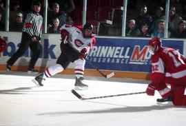 Action during a hockey game against the University of Wisconsin, St. Cloud State University