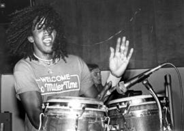 A man plays the bongos at a concert at Atwood Memorial Center (1966), St. Cloud State University