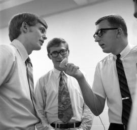 David Boise of the Mitchell Trio is interviewed by WJON's Mike Diem before their concert at Halenbeck Hall (1966), St. Cloud State University