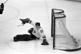 St. Cloud State hockey player Rory Eidsness makes a stop against Bemidji State University