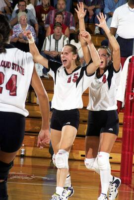 Volleyball player Kim Pellman celebrates during a game against the University of North Dakota
