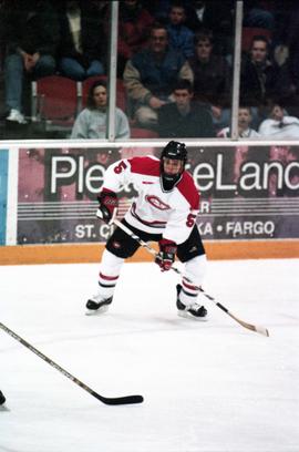 Action during a hockey game against the Michigan Tech University, St. Cloud State University