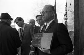 President Robert Wick with a granite plaque of appreciation given by St. Cloud State students