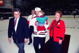 Robert Bess, Morris Kurtz, Brendan McDonald walk off the ice at the National Hockey Center Rink dedication