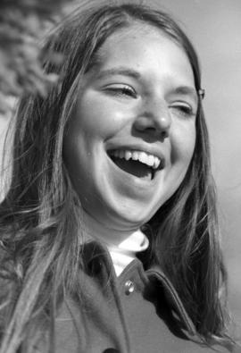 Woman enjoys the homecoming parade, St. Cloud State University