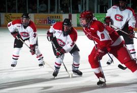 Action during a hockey game against the University of Wisconsin, St. Cloud State University