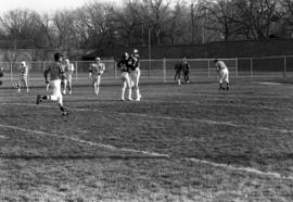 St. Cloud State football player Mike Mullen celebrates with a teammate during a game against Winona State University