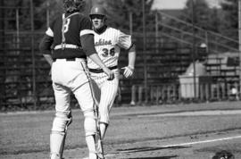 Darrell Watercott scores a run during a St. Cloud State University baseball game against Augsburg College