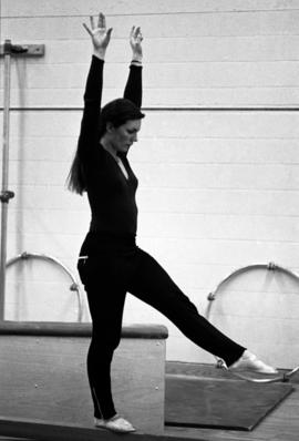 Woman gymnast practices, St. Cloud State University