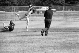 Bob Hegman throws a baseball during a St. Cloud State University baseball game against Augsburg College