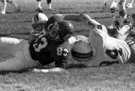 St. Cloud State University football player Mike Mullen is tackled during a football against the University of Minnesota-Duluth