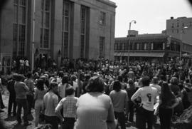 Protestors gather at a building, Day of Peace protest, St. Cloud State University