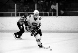 St. Cloud State hockey player Steve Haataja skates with the hockey during a game against Air Force