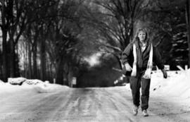 Sandie East walks home from campus on Kilian Boulevard, St. Cloud State University