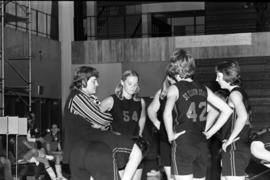 St. Cloud State volleyball coach Gladys Ziemer confers with her players during a volleyball match