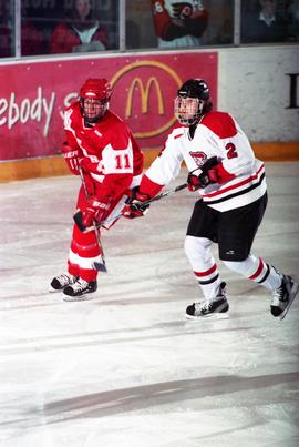 Action during a hockey game against the University of Wisconsin, St. Cloud State University