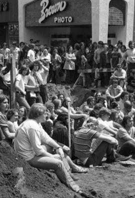 People listen to a speech, Day of Peace protest, St. Cloud State University