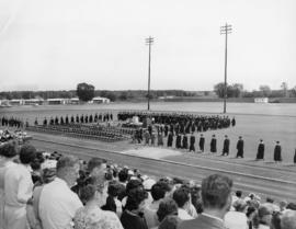 Students file into seats at commencement ceremony, Selke Field (1937), St. Cloud State University