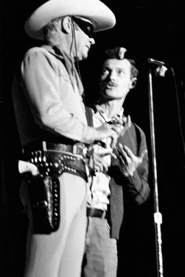 Ken Osmond, better known as Eddie Haskell on the "Leave it to Beaver" television program, and Clayton Moore, better know as the Lone Ranger, perform together at the Salute to the Fabulous Fifties show at Halenbeck Hall (1965), St. Cloud State University